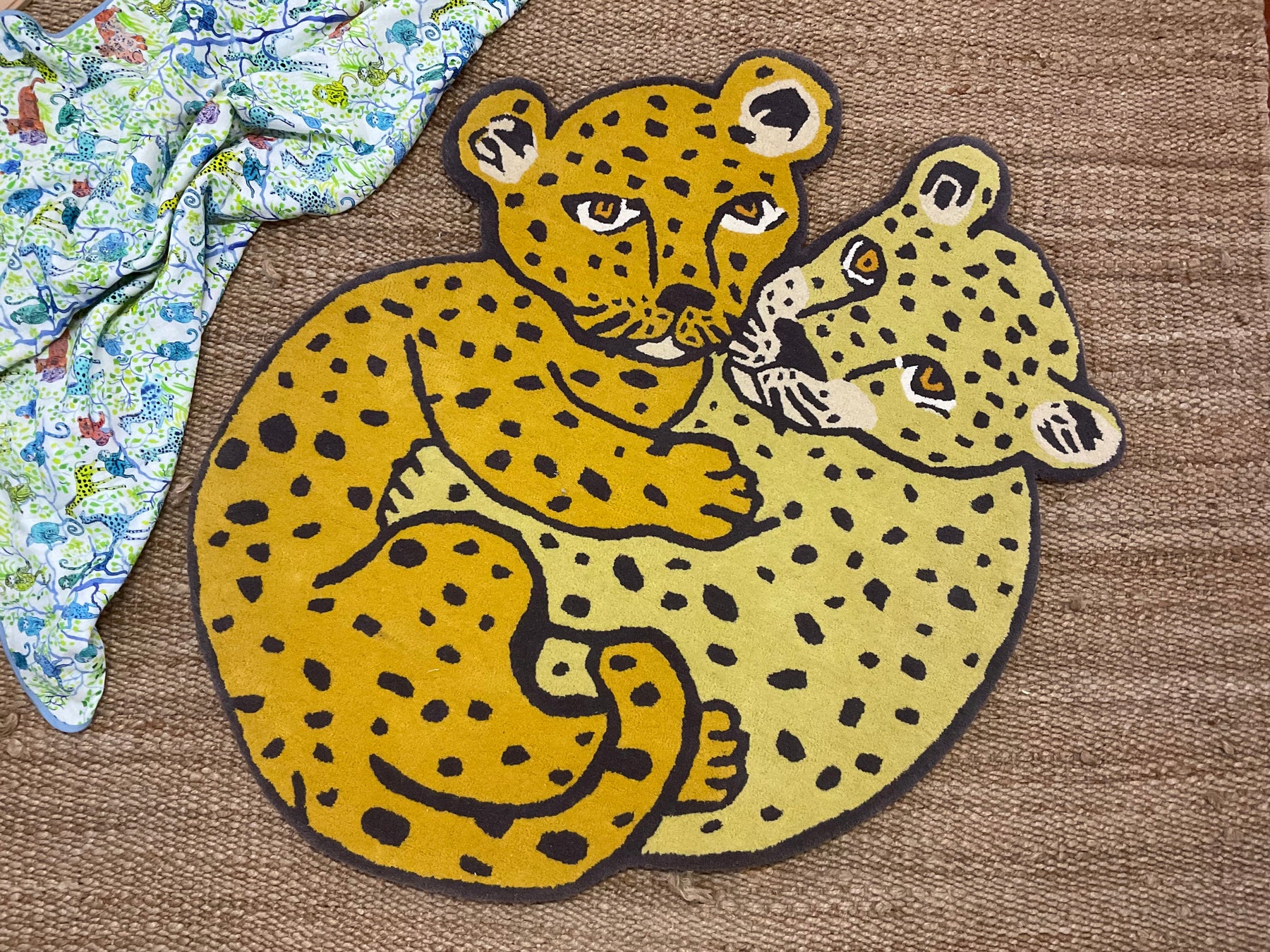 Cuddling Jaguars Area Rug