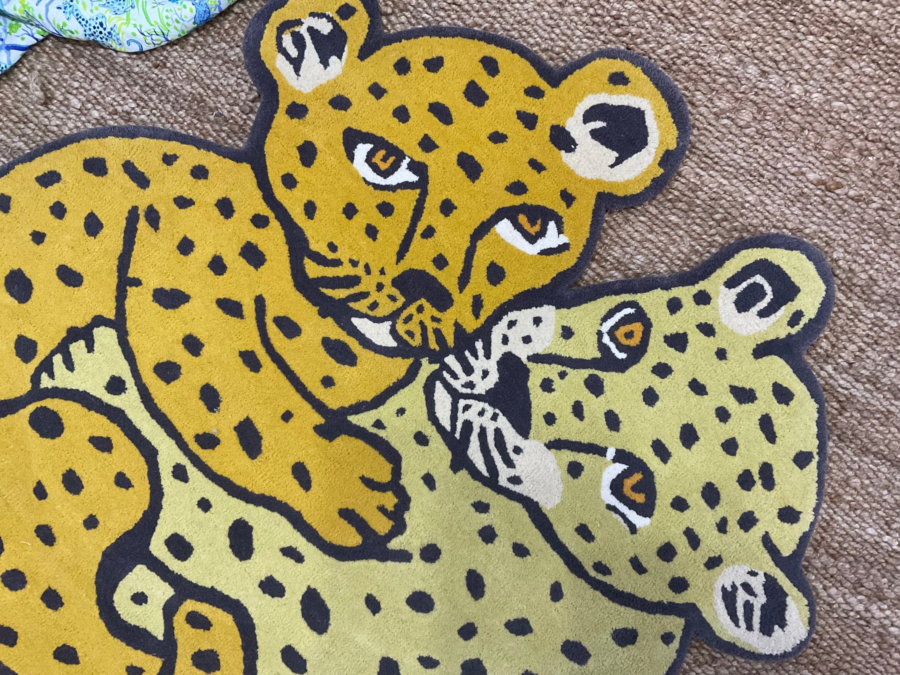 Cuddling Jaguars Area Rug